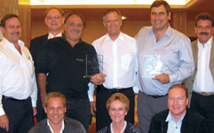 The Comtest team proudly displays its trophies